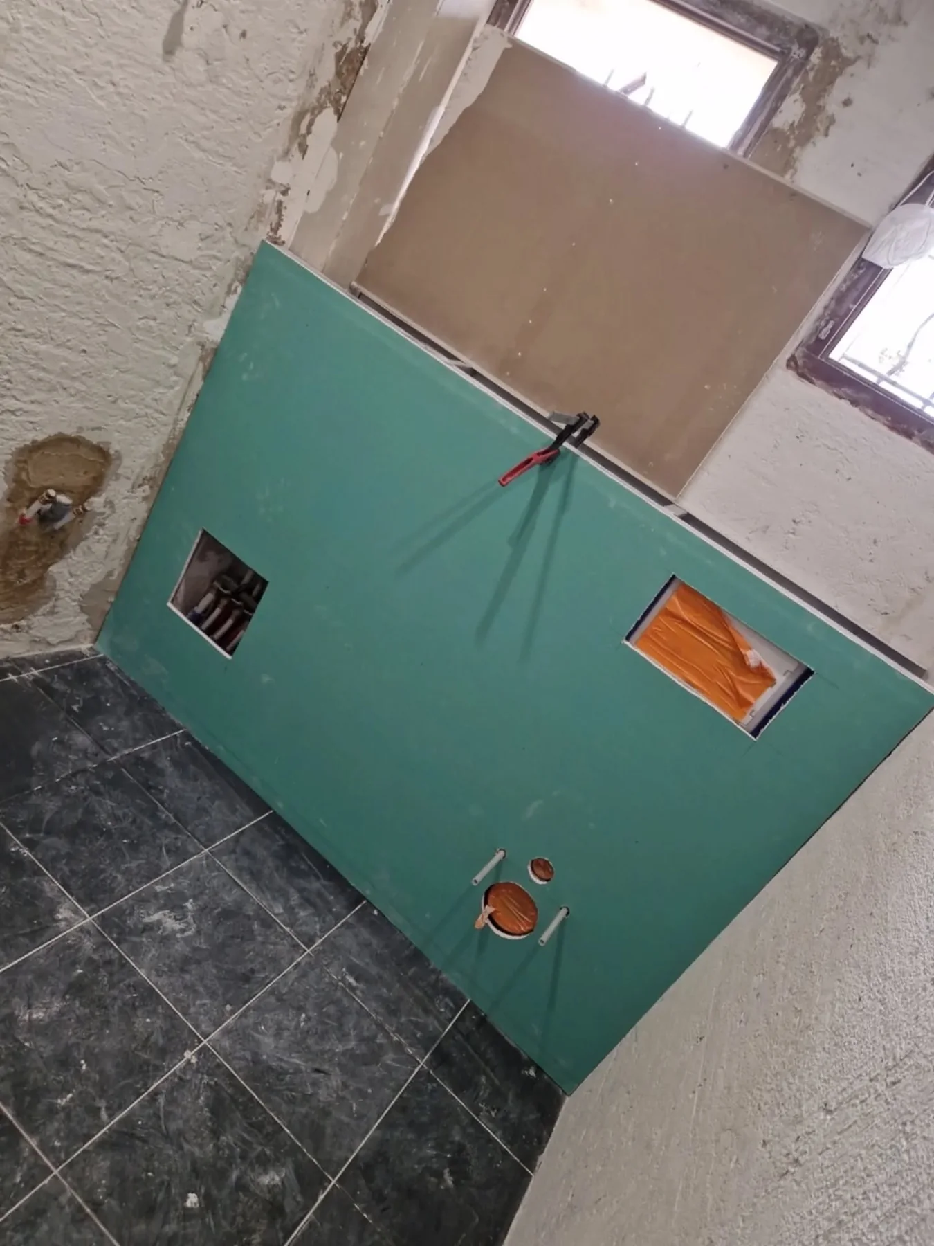 Pose de placo en salle de bain